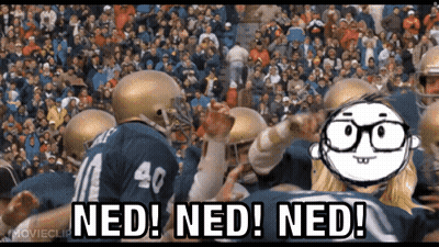 A Football Player With The Number 40 On His Jersey Is Surrounded By Other Players GIF