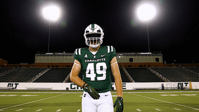 A Football Player With The Number 49 On His Uniform GIF