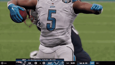 A Football Player With The Number 5 On His Jersey Is Holding A Ball GIF