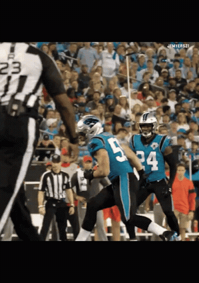 A Football Player With The Number 5 On His Jersey Runs Towards A Referee GIF
