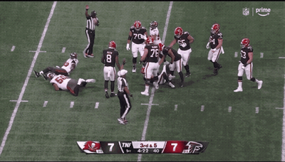 A Football Player With The Number 50 On His Helmet GIF
