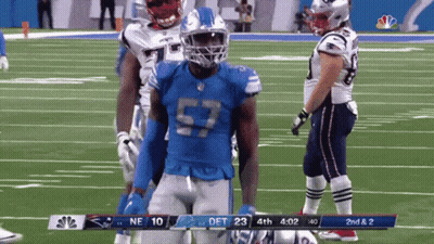 A Football Player With The Number 57 On Their Jersey GIF