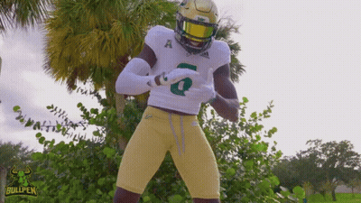 A Football Player With The Number 6 On His Jersey Is Dancing GIF