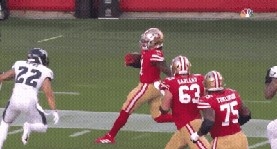 A Football Player With The Number 63 On Their Jersey GIF