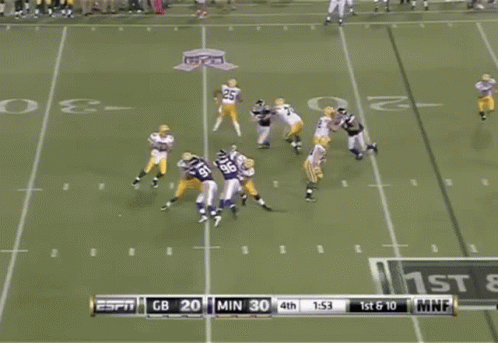 A Football Player With The Number 69 On His Jersey Is Dancing On The Field GIF