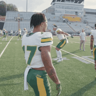 A Football Player With The Number 7 On His Back GIF