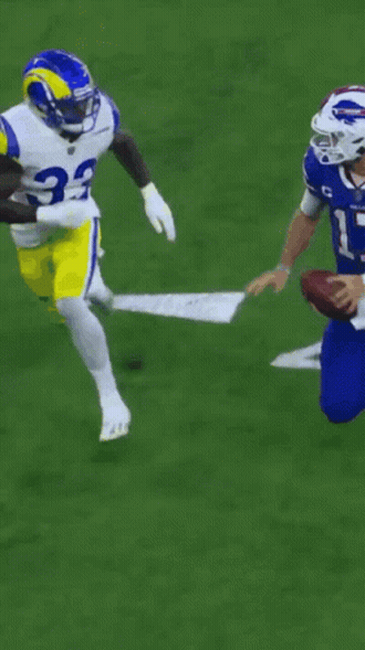 A Football Player With The Number 7 On His Jersey Is Falling GIF