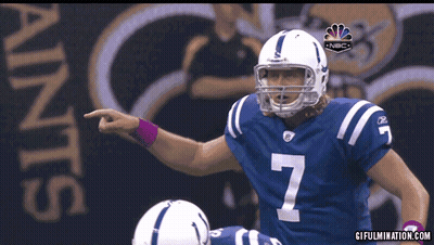 A Football Player With The Number 7 On His Jersey Points At Something GIF
