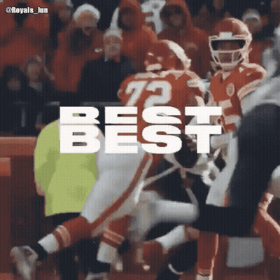 A Football Player With The Number 72 On His Jersey Is Running With The Ball GIF