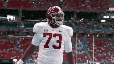 A Football Player With The Number 73 On His Shirt GIF
