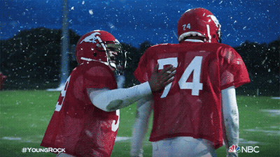 A Football Player With The Number 74 On Their Jersey GIF