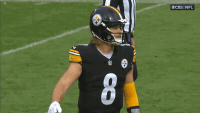 A Football Player With The Number 8 On His Jersey Giving A Thumbs Up GIF
