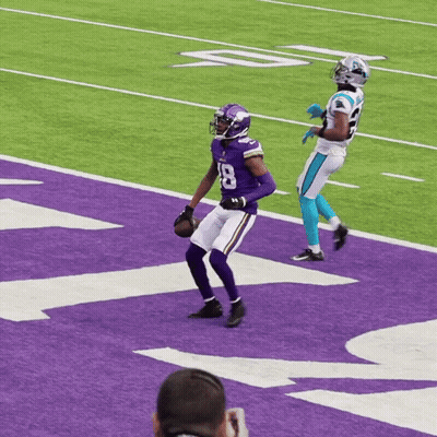 A Football Player With The Number 8 On His Jersey Is On The Field GIF