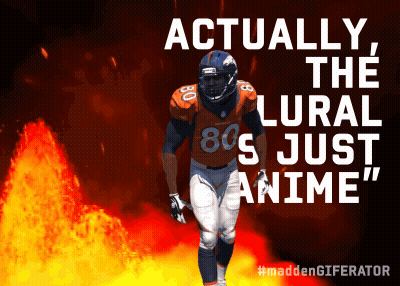 A Football Player With The Number 80 On His Jersey Stands In Front Of A Fire GIF