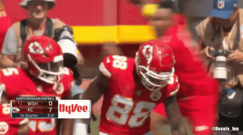 A Football Player With The Number 88 On His Jersey Stands On The Field GIF