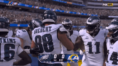 A Football Player With The Number 88 On The Back GIF