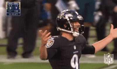 A Football Player With The Number 9 On His Jersey Is Giving A Thumbs Up . GIF