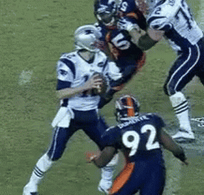 A Football Player With The Number 92 On His Jersey GIF
