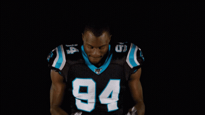 A Football Player With The Number 94 On His Shirt GIF