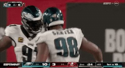 A Football Player With The Number 98 On His Back GIF