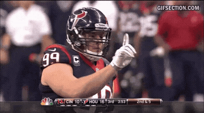 A Football Player With The Number 99 On His Jersey Is Giving A Thumbs Up GIF