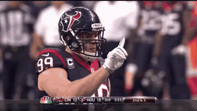 A Football Player With The Number 99 On His Jersey Is Giving A Thumbs Up GIF