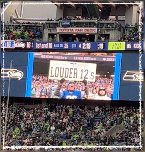 A Football Stadium With A Sign That Says Louder 12 'S On It GIF