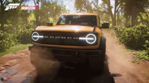 A Ford Bronco Is Driving Down A Dirt Road In A Video Game GIF