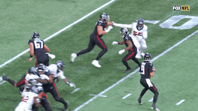 A Fox Nfl Football Game Is Being Played On A Field GIF