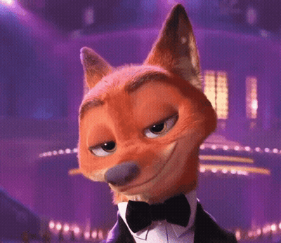 A Fox Wearing A Tuxedo And Bow Tie GIF