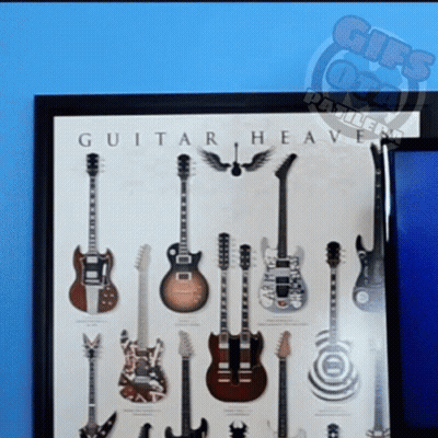 A Framed Guitar Heaven Poster With Many Different Guitars GIF