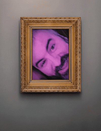 A Framed Picture Of A Man With A Beard GIF