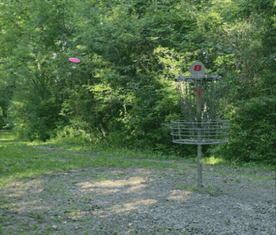 A Frisbee Is Being Thrown Into A Basket That Has The Letter B On It GIF