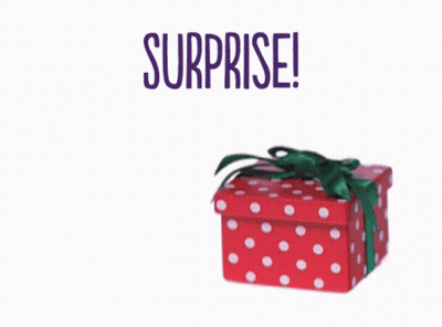 A Frog Is Peeking Out Of A Red Polka Dot Gift Box With The Words Surprise Written Above It GIF