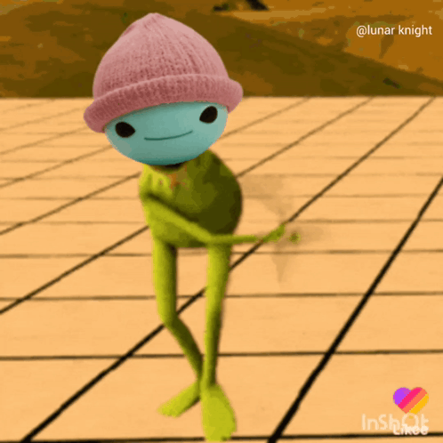 A Frog Wearing A Pink Beanie Is Dancing On A Tiled Floor GIF