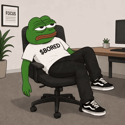 A Frog Wearing A Shirt That Says Bored Is Sitting In An Office Chair GIF