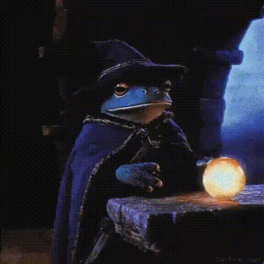A Frog Wearing A Wizard Hat And Cape Is Holding A Magical Ball . GIF