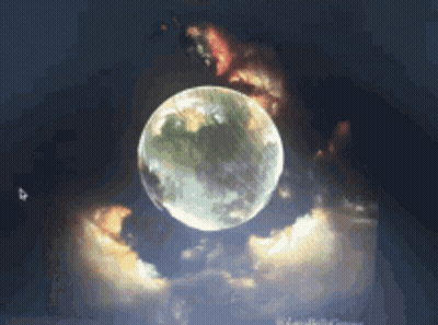 A Full Moon Is Surrounded By Clouds In The Sky GIF