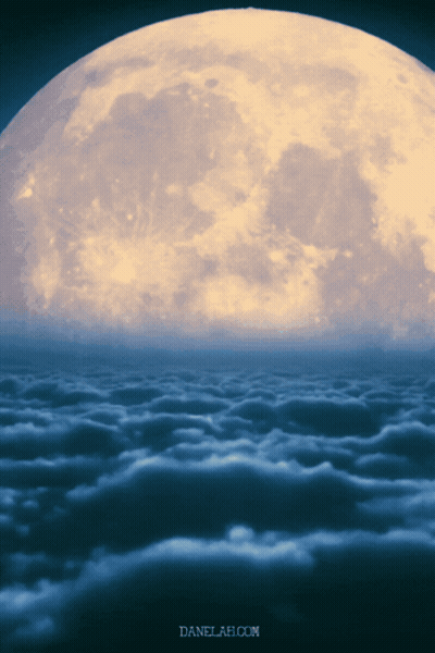 A Full Moon Is Visible Over A Cloudy Sky GIF
