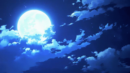 A Full Moon Shines Brightly In A Dark Blue Sky GIF
