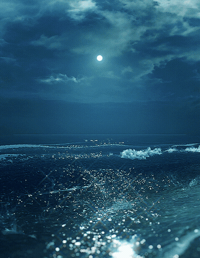 A Full Moon Shines Brightly Over A Body Of Water GIF