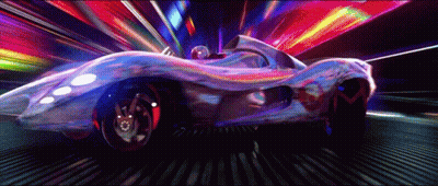 A Futuristic Car Is Driving Down A Street With A Rainbow Of Lights Behind It GIF