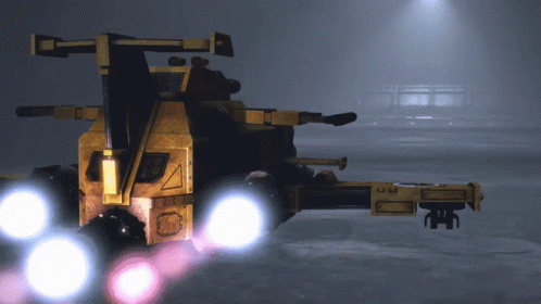 A Futuristic Looking Vehicle With A Triangle On The Side Of It GIF