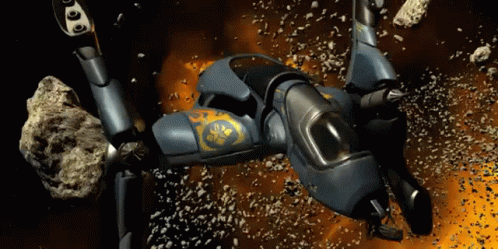 A Futuristic Space Ship With A Gold Emblem On It GIF