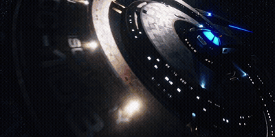 A Futuristic Space Ship With The Number 15 On It GIF