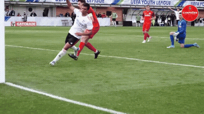 A Gatorade Ad Can Be Seen In The Background Of This Soccer Game GIF