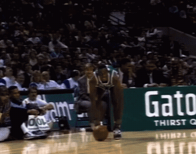 A Gatorade Ad Is On The Side Of The Court GIF