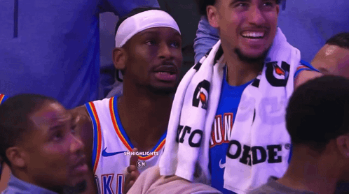 A Gatorade Towel Is Wrapped Around A Basketball Player 'S Shoulder GIF