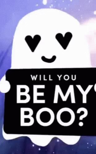 A Ghost Is Holding A Sign That Says Will You Be My Boo ? GIF