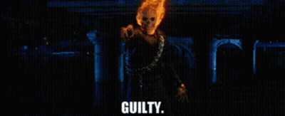 A Ghost Rider With A Chain Around His Neck Is Pointing At The Camera And Saying Guilty . GIF